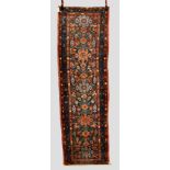 Hamadan runner, north west Persia, about 1920s-30s, 9ft. 2in. x 2ft. 8in. 2.80m. x 0.81m. Overall