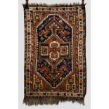 Three rugs all 1920s-30s, comprising: Fars rug, Shiraz area, south west Persia, 4ft. 3in. x 2ft.