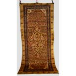 Attractive Sarab long rug, north west Persia, circa 1920s, 10ft. 5in. x 4ft. 10in. 3.17m. x 1.47m.