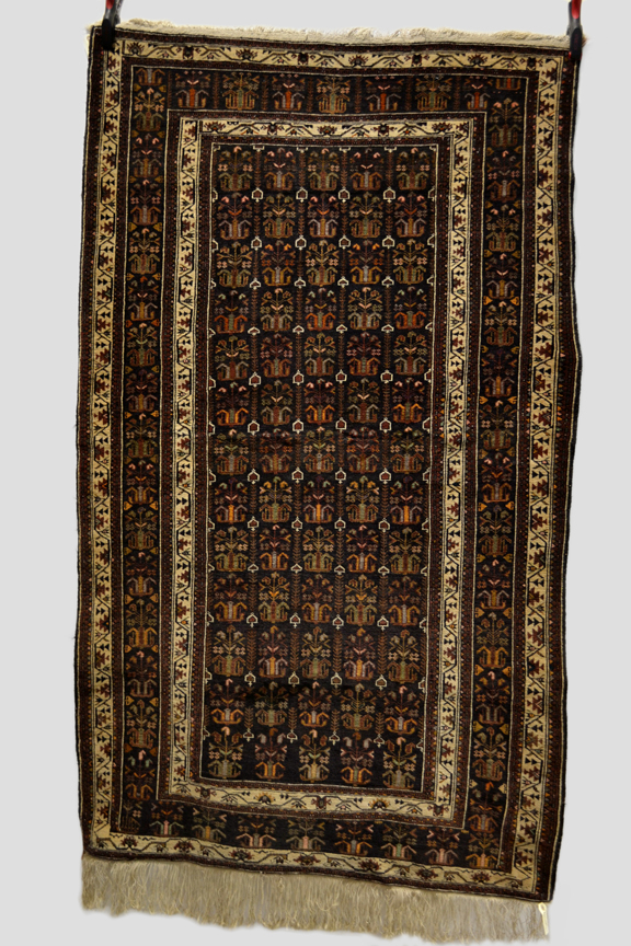 Fine Baluchi rug, Khorassan, north east Persia, late 20th century, 6ft. 5in. x 3ft. 10in. 1.96m. x