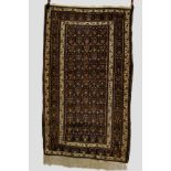 Fine Baluchi rug, Khorassan, north east Persia, late 20th century, 6ft. 5in. x 3ft. 10in. 1.96m. x