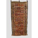 Moghan long rug with Memlinc guls within octagons, south east Caucasus, early 20th century, 9ft.