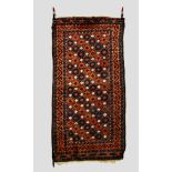 Baluchi rug, Khorasan, north east Persia, circa 1920s-30s, 6ft. 5in. x 3ft. 4in. 1.96m. x 1.02m.