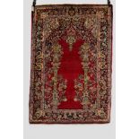 Kashan prayer rug, west Persia, mid-20th century, 5ft. 3in. x 3ft. 7in. 1.60m. x 1.09m.