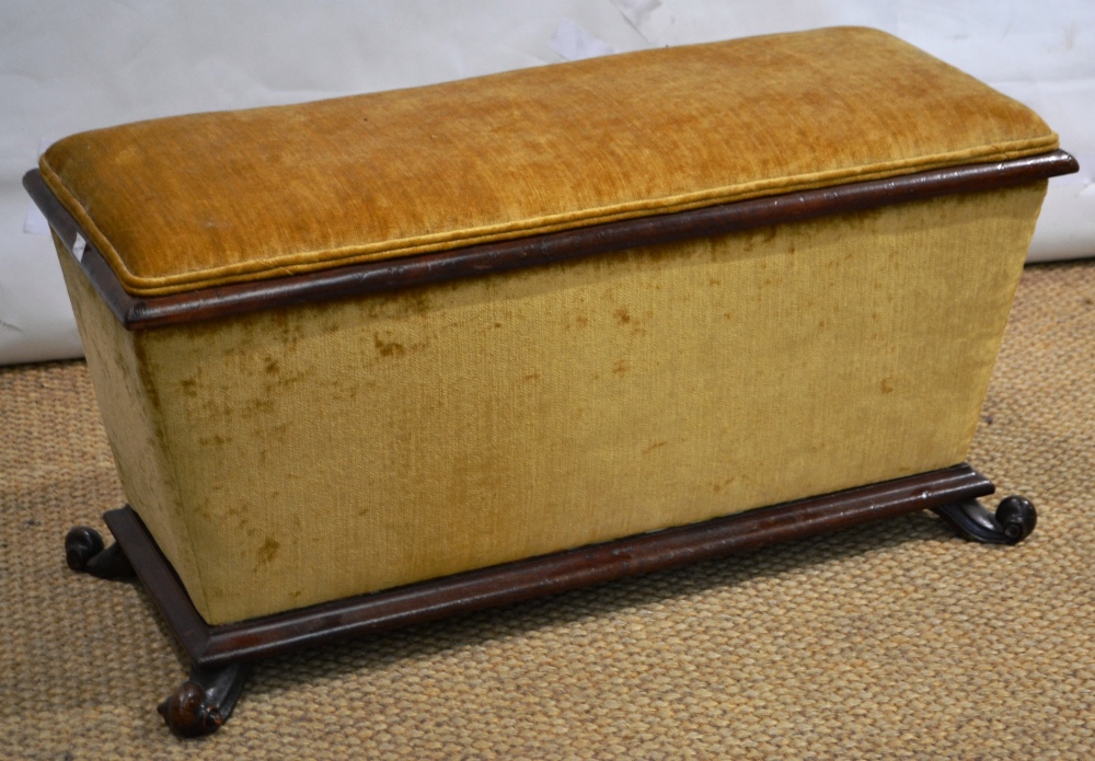 A Victorian duet ottoman stool, the mahogany show frame covered in old gold dralon, the interior