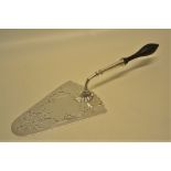An early George III silver serving slice with pierced and engraved fretwork to the blade, a shell