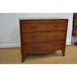 A late Regency faded mahogany veneered commode, the frieze inlaid stringing with an outline dummy