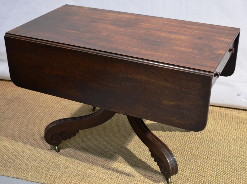 An early nineteenth century mahogany supper table, in the manner of Duncan Phyfe the rectangular