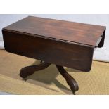 An early nineteenth century mahogany supper table, in the manner of Duncan Phyfe the rectangular