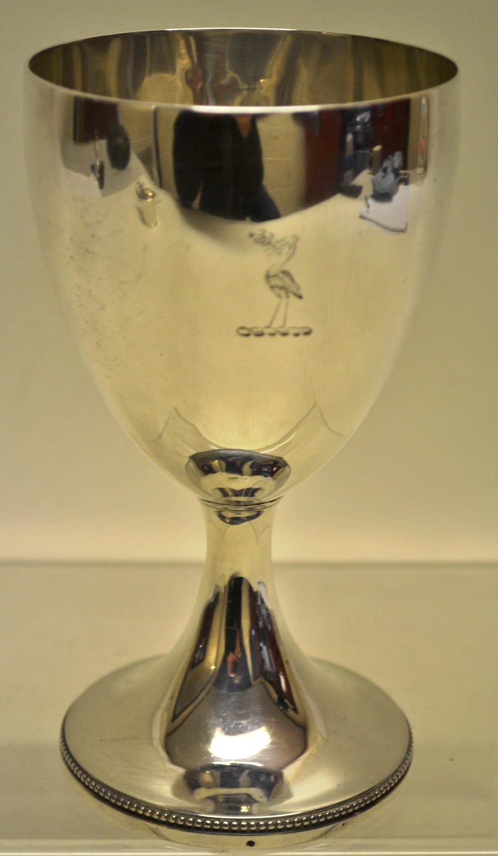 Hester Bateman. A George III wine goblet, engraved a stork crest, on a beaded edge stem foot. 6.25in