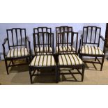 A set of six mahogany dining chairs of Sheraton design, the backs with capitals to the reeded