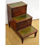 A Regency mahogany bedsteps night commode, the treads inset green gilt tooled leather, the centre