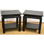 A pair of ebonised oriental style occasional tables, the rectangular tops inset black gilt tooled