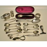 A George III silver feather edge table spoon, four shell bowl teaspoons, bright cut, four other