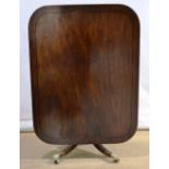 A large Regency mahogany breakfast table, the rectangular tilt top (with some restoration) inlaid