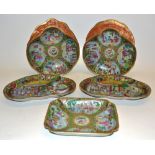 A suite of five nineteenth century Cantonese celadon porcelain dishes, decorated in famille rose