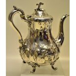 Hunt and Roskell late Storr and Mortimer. A Victorian silver rococo Revival coffee pot, the panelled