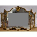 A nineteenth century gilt plaster rococo decorated landscape overmantle mirror, the acanthus