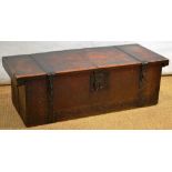 An early seventeenth century Italian cedar chest, the lid with iron strap hinges with clasp to the