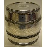A Victorian electroplated biscuit barrel, engine turned with beaded coopering, the hinged lid