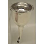 A George IV Irish silver wine funnel, the detachable strainer with a side clip, the spout with