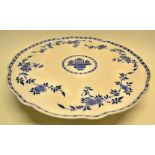 A large Victorian Minton china blue and white circular lazy Susan , decorated an urn and flowers and