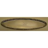 A Victorian silver elliptical pen tray, engraved a swan and coronet crest, a raised beaded edge