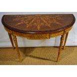 A copy of an Adam style elliptical console table, the top veneered in burr yew with neo classical