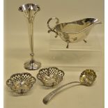A Regency silver Old English pattern sifter ladle, later chased with initials, with gilded repouse