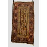 Four Baluchi rugs, Khorasan, north east Persia, late 19th/20th century, the first with camel