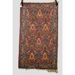 Tabriz rug, red field, north west Persia, circa 1930s-40s, 4ft. 3in. x 2ft. 6in. 1.30m. x 0.76m. Few