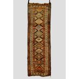 Moghan runner with a single row of Memlinc guls, south east Caucasus, circa 1930s, 8ft. 4in. x