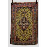 Tabriz rug, north west Persia, circa 1920s-30s, 4ft. 4in. x 2ft. 10in. 1.32m. x 0.86m. Overall wear,