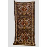 Lenkoran long rug with three large typical medallions on a brown field, Talish area, south east