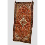 Hamadan long rug, north west Persia, circa 1920s-30s, 7ft. 6in. x 3ft. 6in. 2.29m. x 1.07m. Old moth
