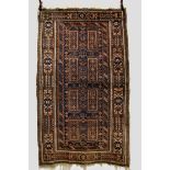 Baluchi rug, Khorasan, north east Persia, early 20th century, 6ft. 7in. x 3ft. 11in. 2.01m. x 1.20m.
