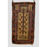 Three Baluchi rugs, Khorasan, north east Persia, late 19th/early 20th century; the first a prayer