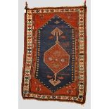 Kazak rug, south west Caucasus, early 20th century, 6ft. x 4ft. 1in. 1.83m. x 1.25m. Overall wear,