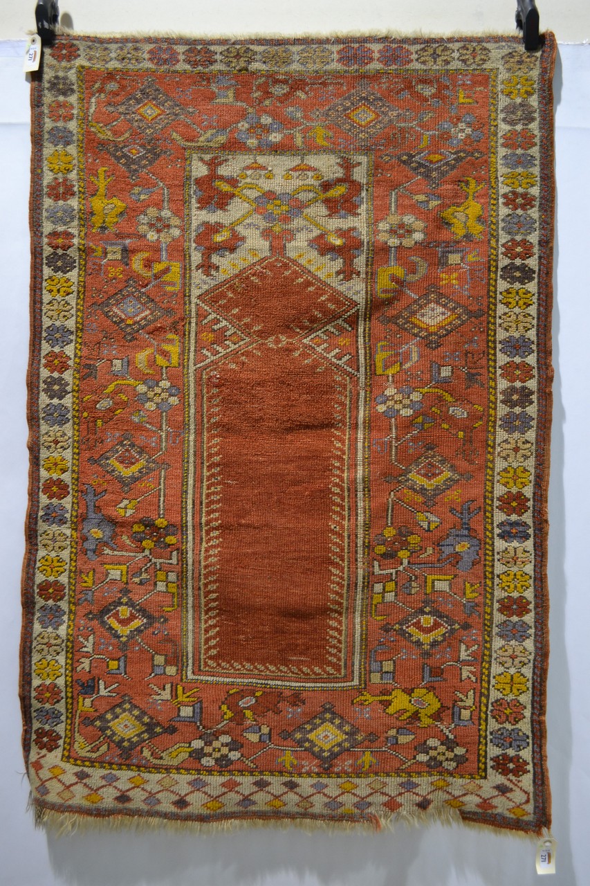 Melas prayer rug, west Anatolia, late 19th/early 20th century, 4ft. 9in. x 3ft. 1in. 1.45m. x 0.94m.