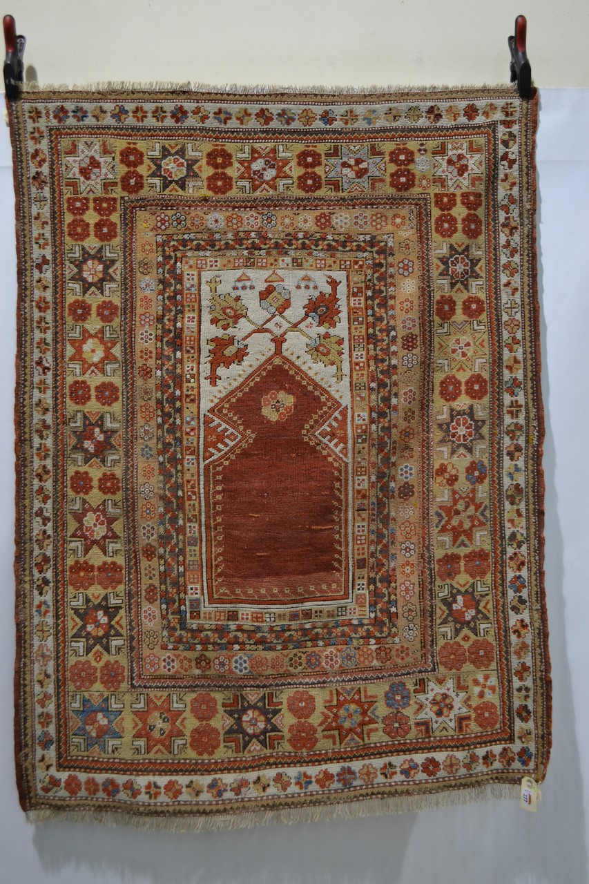 Exceptional Melas prayer rug, west Anatolia, first half 19th century, 4ft. 11in. x 3ft. 8in. 1.
