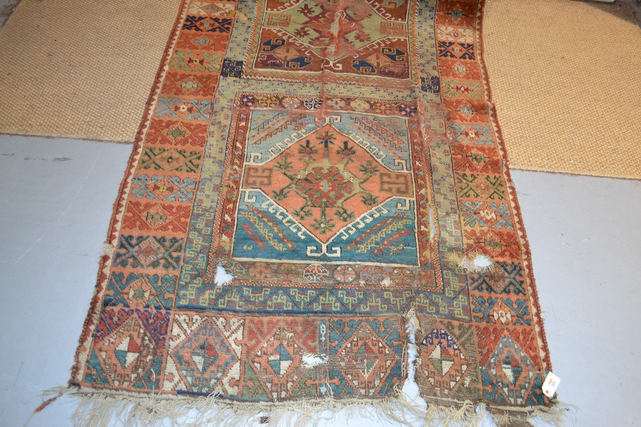 Yuruk long rug of panelled design, east Anatolia, second half 19th century, 14ft. 4in. x 4ft. 5in. - Image 2 of 4