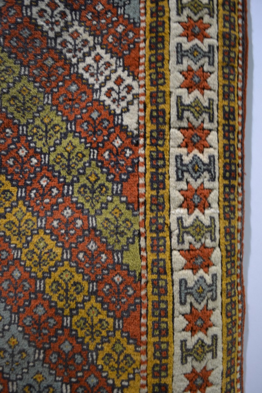 Quchan Kurd rug with multi-coloured diagonal striped field and an ivory star and medallion main - Image 4 of 5
