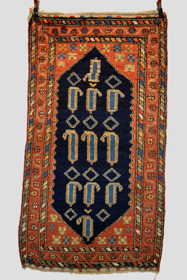 Hamadan rug, north west Persia, mid-20th century, 6ft. 4in. x 3ft. 7in. 1.93m. x 1.09m. Note the