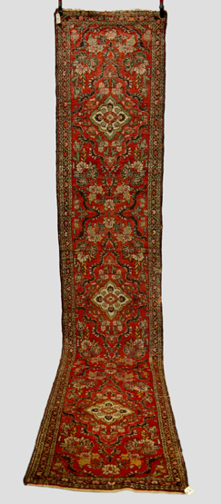 Hamadan runner, north west Persia, circa 1930s, 14ft. 7in. x 2ft. 9in. 4.45m. x 0.84m. Some areas of