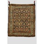 Kurdish rug, north west Persia, circa 1920s-30s, 4ft. 1in. x 3ft. 9in. 1.25m. x 1.14m. Overall wear;