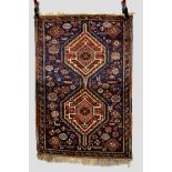Khamseh rug, Fars, south west Persia, early 20th century, 3ft. 9in. x 2ft. 7in. 1.14m. x 0.79m. Some