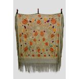 Interesting Chinese beige/stone coloured silk shawl, exquisitely embroidered in coloured silks