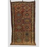 Unusual Sumac long rug of Lenkoran design on a soft red field, Kuba region, north east Caucasus,