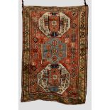 Kazak three-medallion rug, south west Caucasus, late 19th/early 20th century, 6ft. 11in. x 4ft.