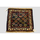 Shahsavan mat, north west Persia, circa 1920s, 1ft. 8in. x 1ft. 11in. 0.51m. x 0.58m. Overall